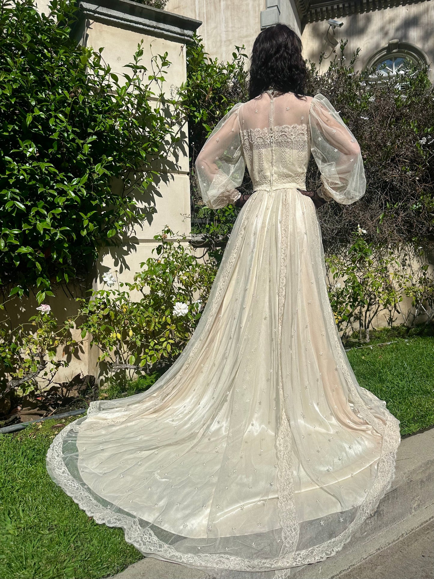 One-of-One Vintage 1970's Ecru Lace and Netting Wedding Gown With A Cascading Train