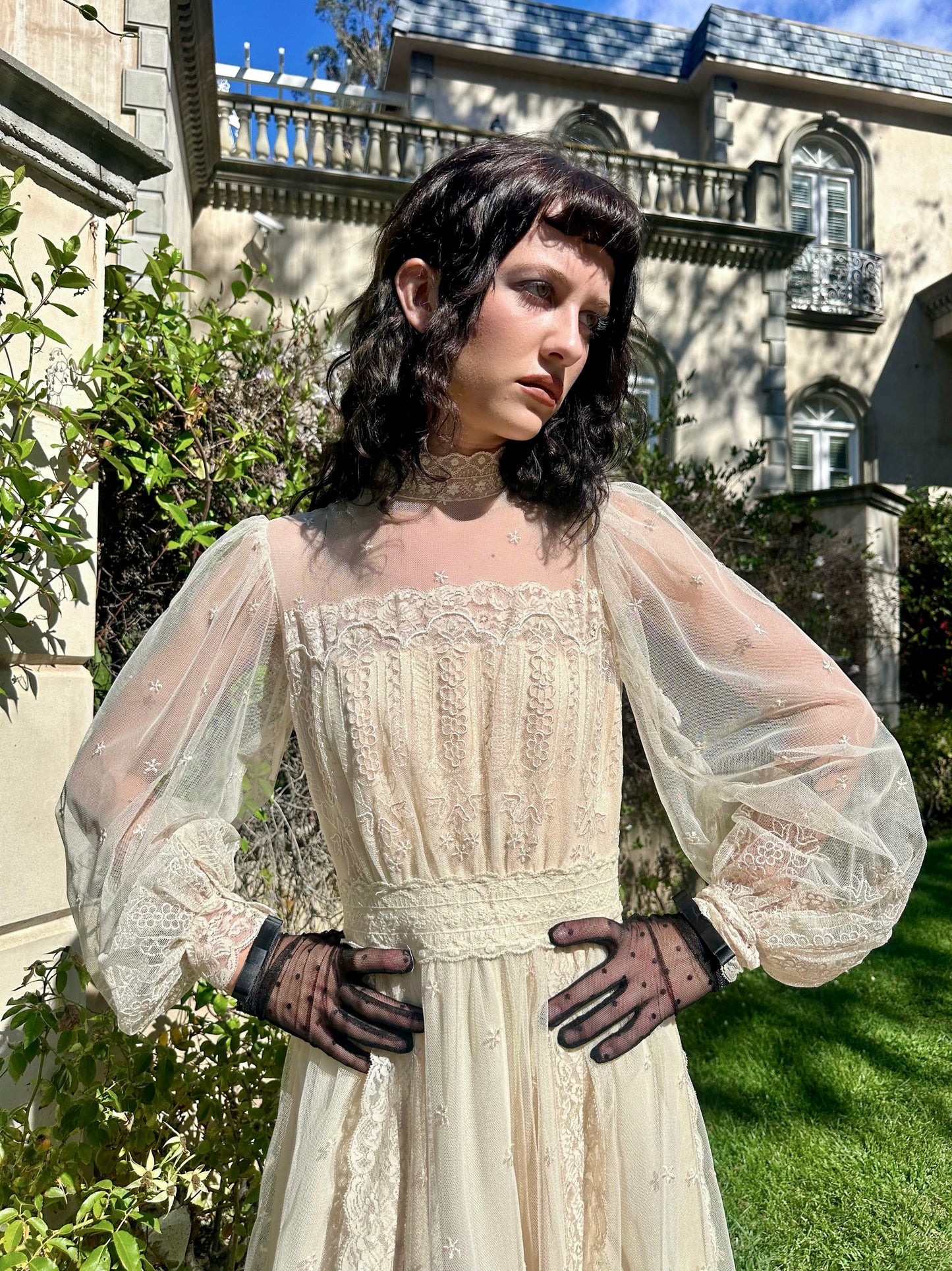 One-of-One Vintage 1970's Ecru Lace and Netting Wedding Gown With A Cascading Train
