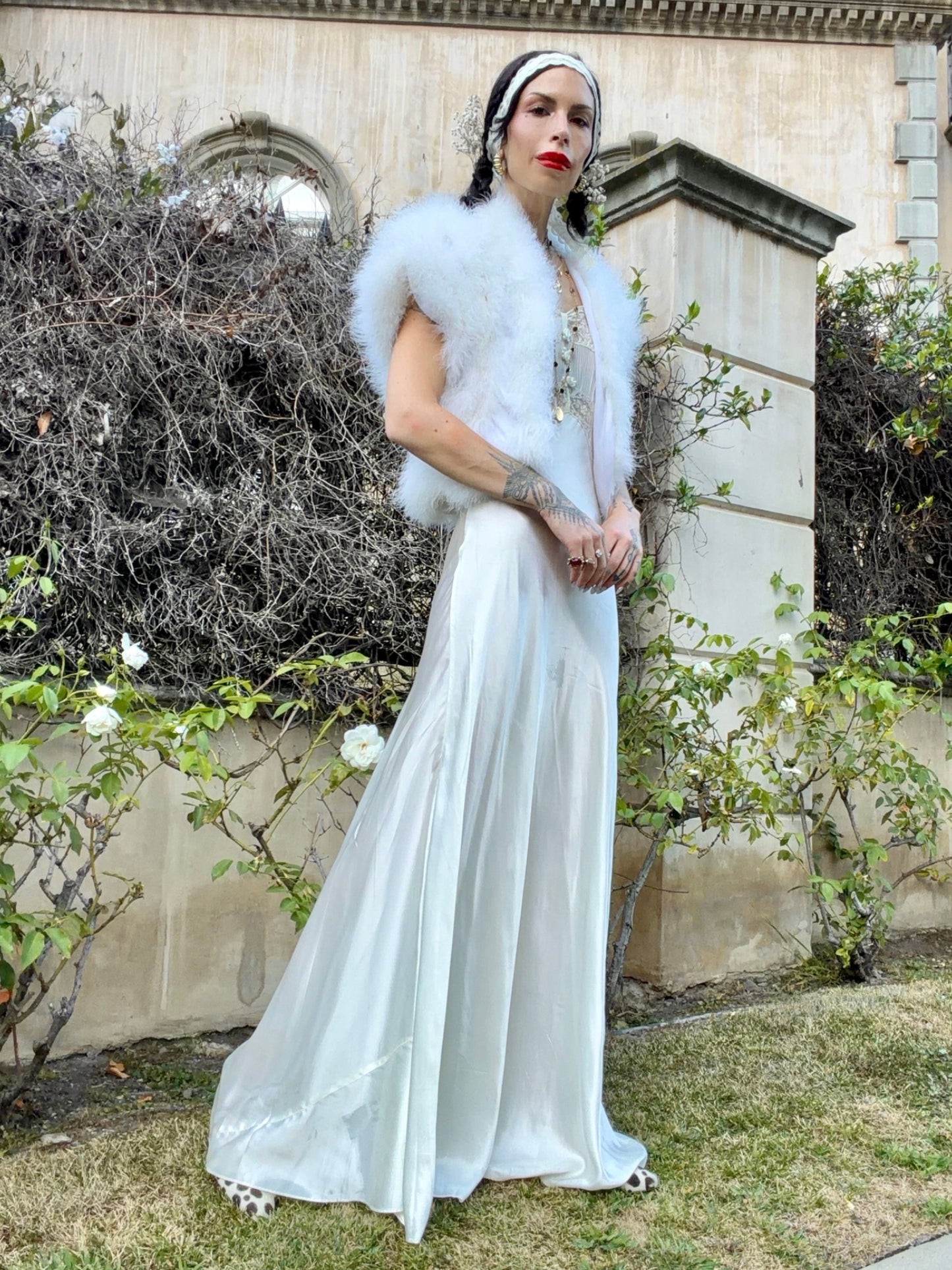 woman wearing antique 1930's silk slip gown in bone white with ivory lace and bias cut skirt