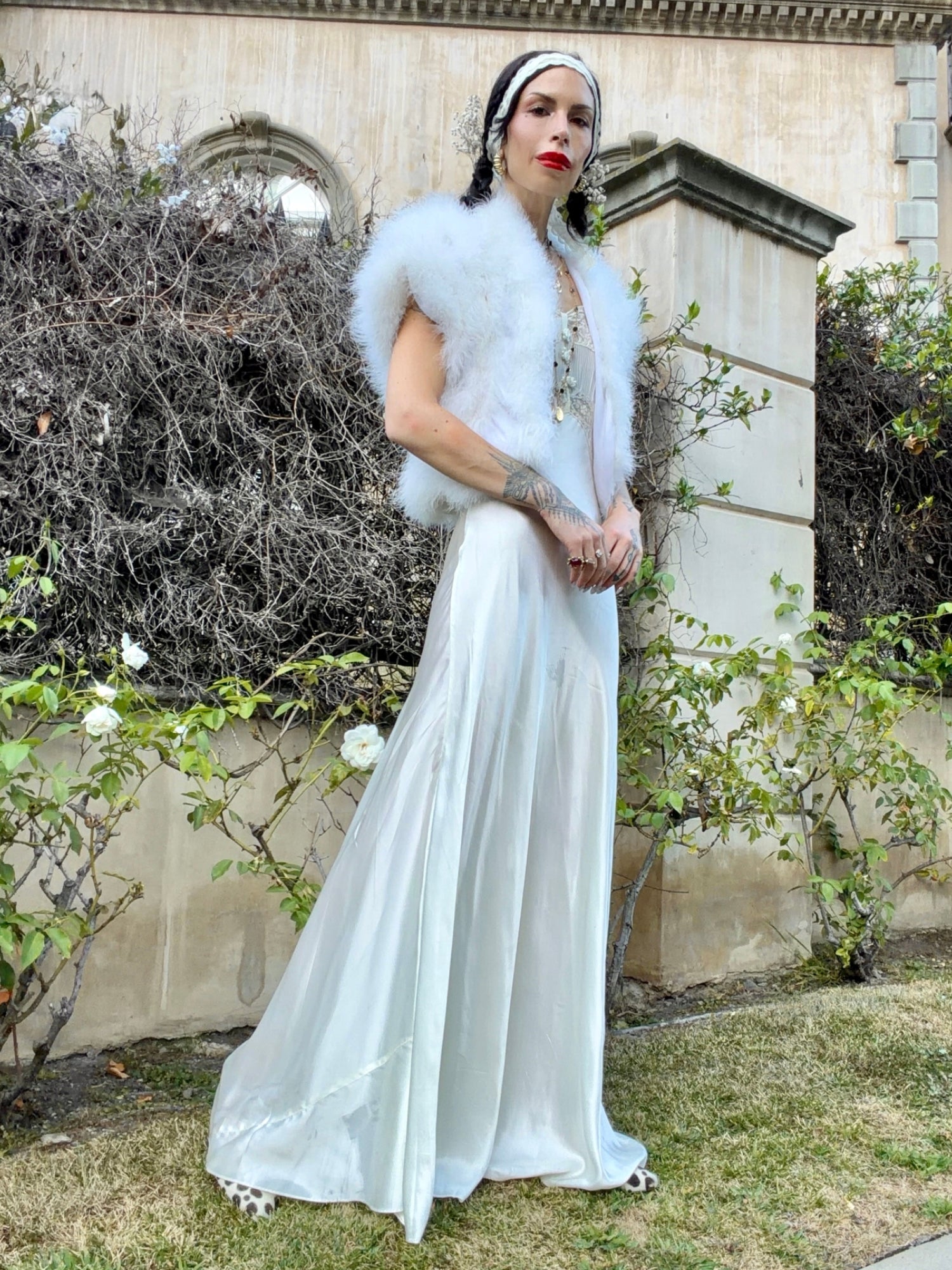 woman wearing antique 1930's silk slip gown in bone white with ivory lace and bias cut skirt